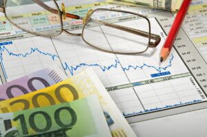 Gráfico financiero con proyecciones de mercado y análisis económico, utilizado para explicar el comportamiento de los mercados en 2025 y el panorama financiero de 2026.